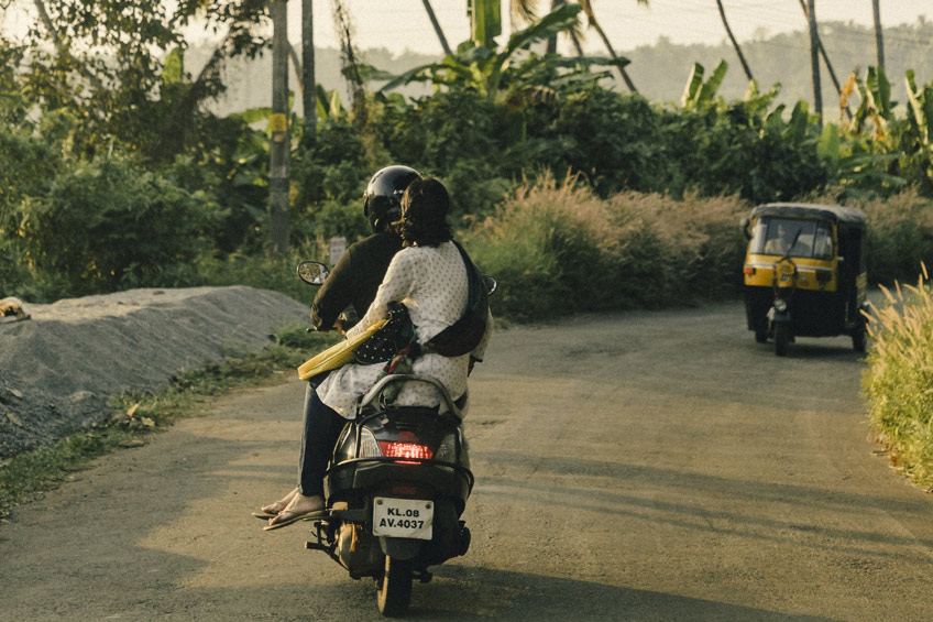 couple en scooter Asie