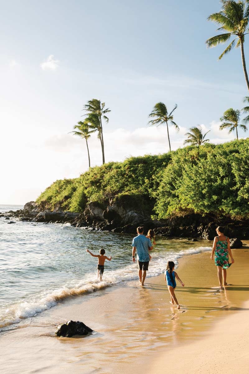 famille à la plage à Hawaii
